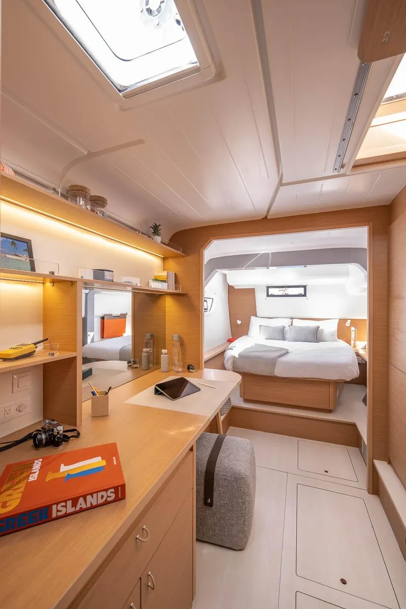 Slide: The Image of Luxurious interior of 2025 Excess 14 yacht, featuring a cozy bedroom and modern amenities. - 15