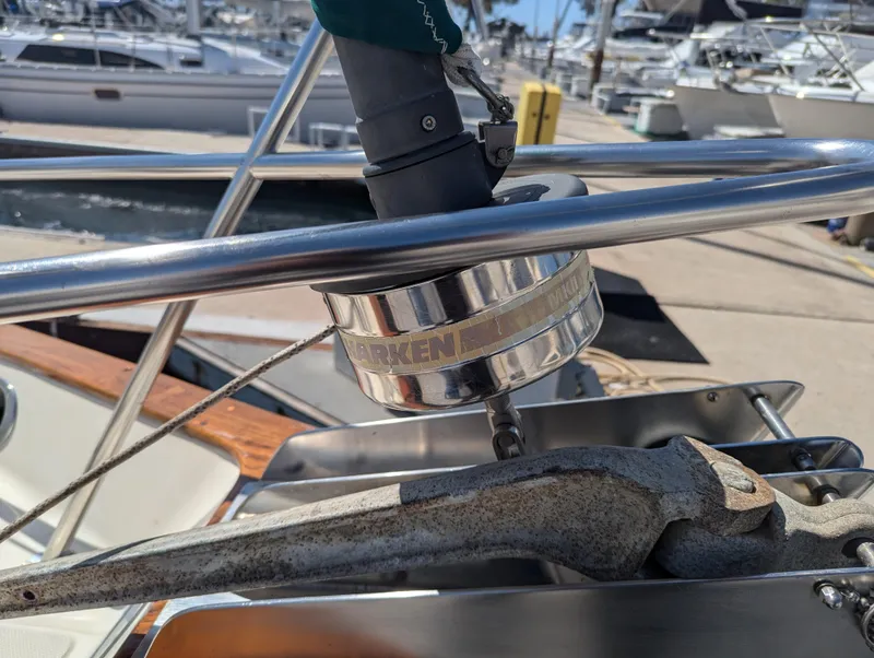 Slide: The Image of Close-up of a 1995 Pacific Seacraft 34 sailboat's anchor windlass in a marina. - 34