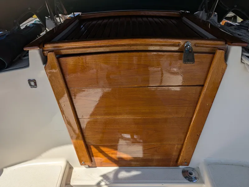 Slide: The Image of Polished wooden hatch of a 1995 Pacific Seacraft 34 sailboat. - 37