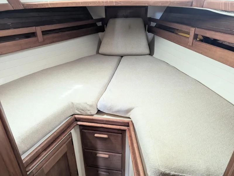 Slide: The Image of Cozy cabin interior of 1995 Pacific Seacraft 34 sailboat with cushioned V-berth. - 47