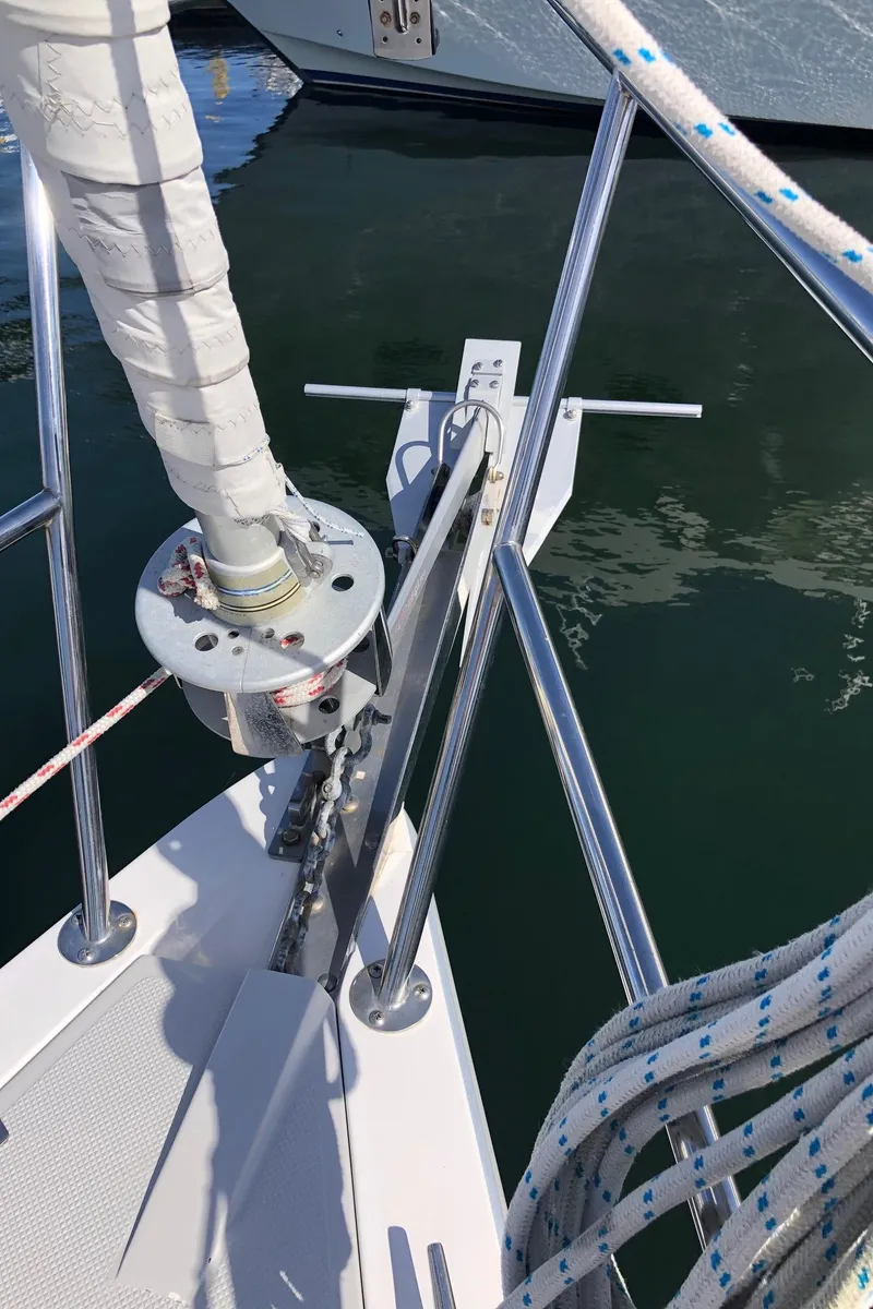 Slide: The Image of Bow of 2005 Catalina 310 sailboat with anchor and rigging details. - 14