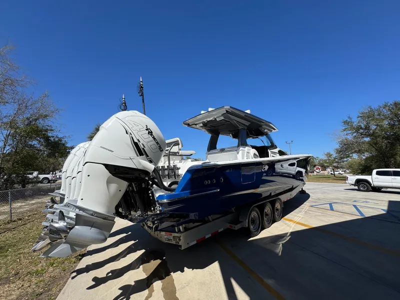 Slide: The Image of 2018 Nor-Tech 452 Super Fish boat on trailer with powerful outboard engines. - 15