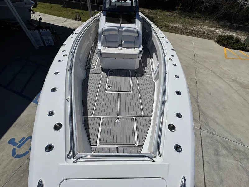 Slide: The Image of 2018 Nor-Tech 452 Super Fish boat with spacious deck and seating. - 22