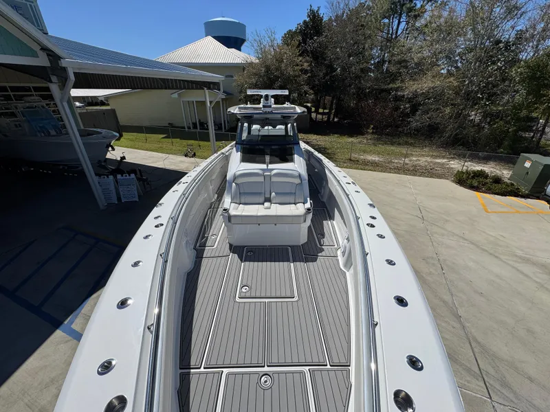 Slide: The Image of 2018 Nor-Tech 452 Super Fish boat with spacious deck and sleek design. - 23