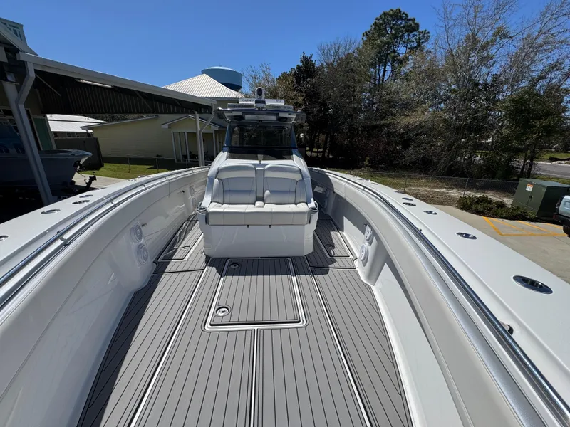 Slide: The Image of 2018 Nor-Tech 452 Super Fish boat with spacious deck and seating area. - 24