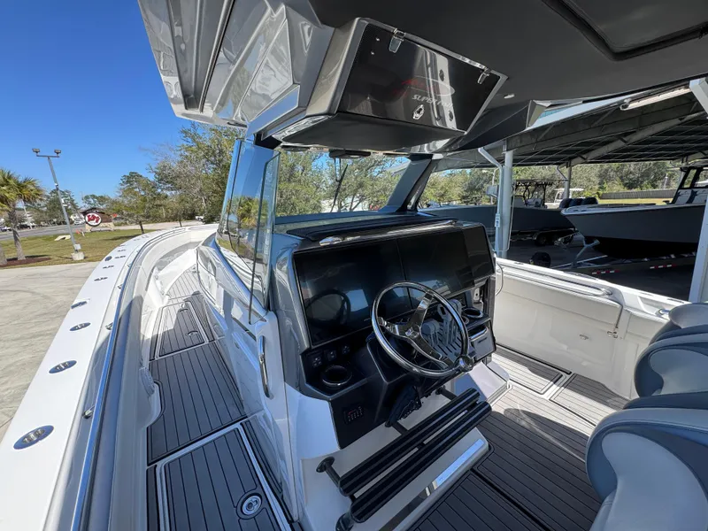 Slide: The Image of 2018 Nor-Tech 452 Super Fish boat interior with sleek design and modern controls. - 33