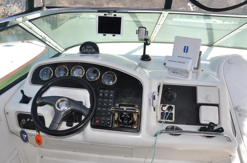 Slide: The Image of Pilothouse of 2000 Carver 530 Voyager with steering wheel and navigation instruments. - 15