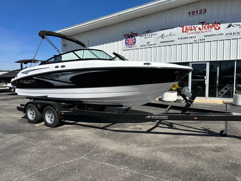 The Image of 2025 Monterey M20 boat on trailer outside dealership. - 0