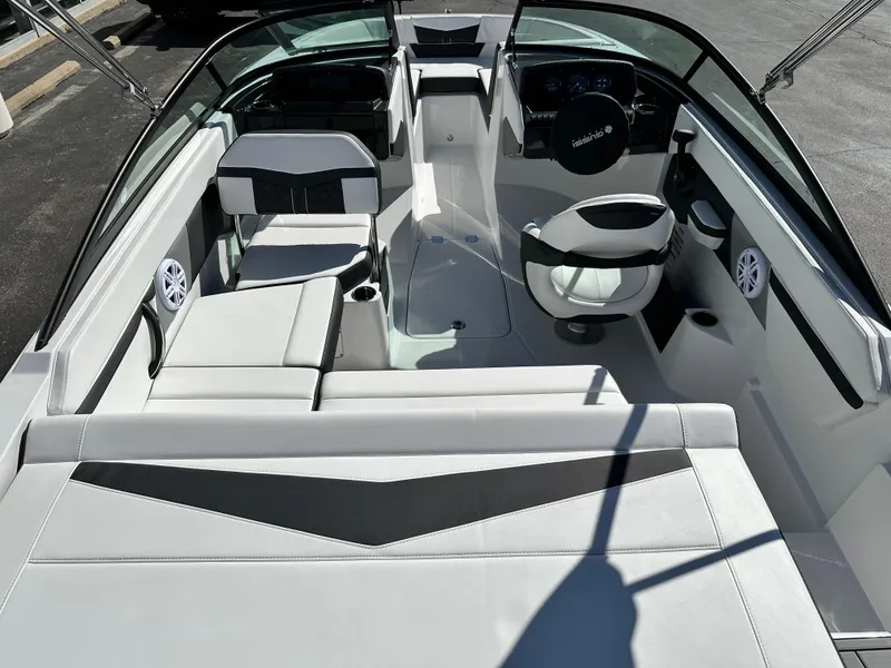 Slide: The Image of 2025 Monterey M20 boat interior with sleek seating and modern dashboard design. - 4