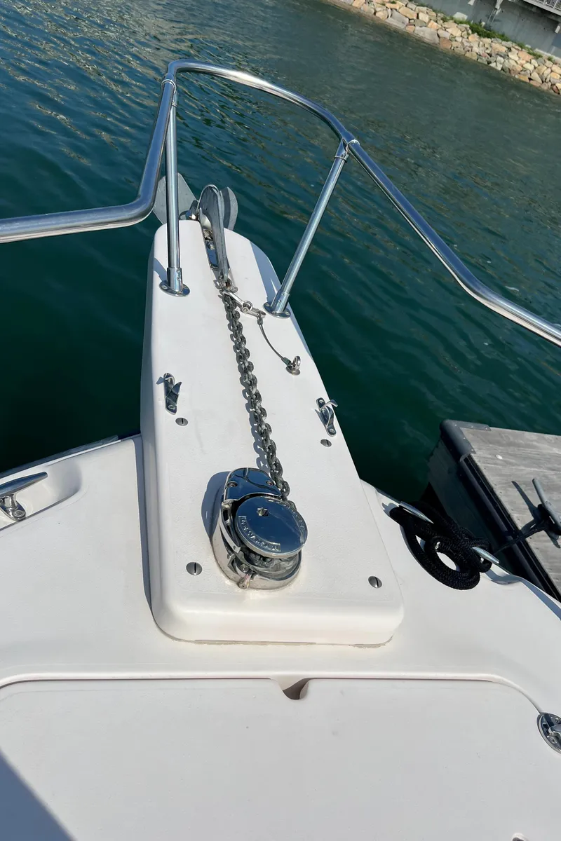 Slide: The Image of Bow of 2005 Grady-White 283 RELEASE boat with anchor chain and railing. - 12