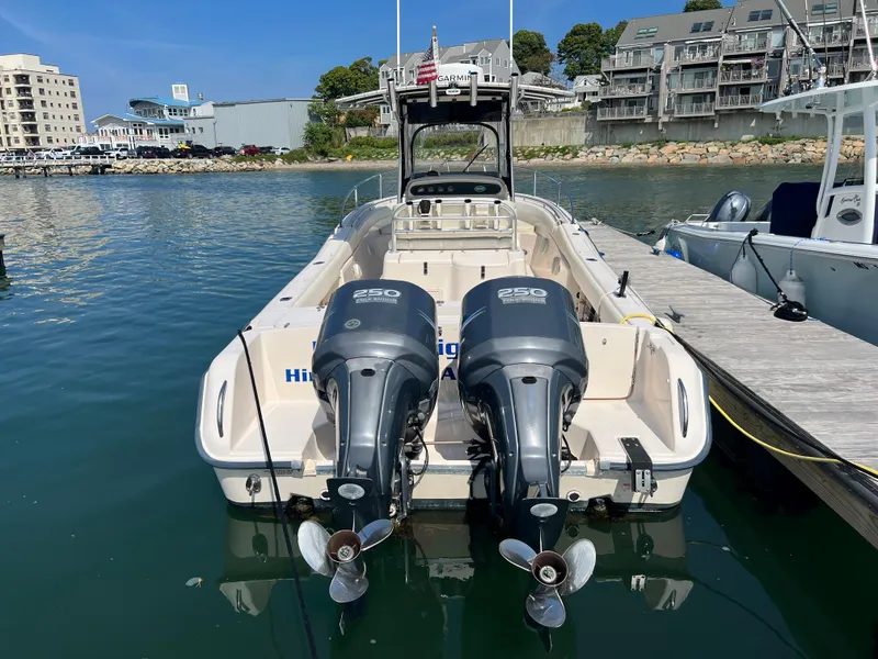 Slide: The Image of 2005 Grady-White 283 RELEASE boat docked with twin 250 horsepower engines. - 2