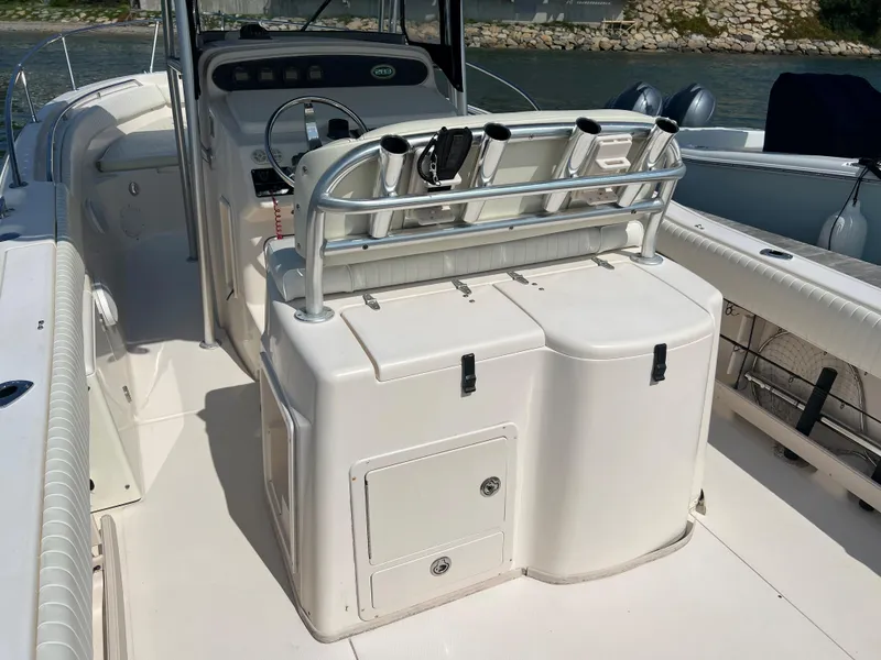 Slide: The Image of 2005 Grady-White 283 RELEASE boat interior with helm and seating area. - 7