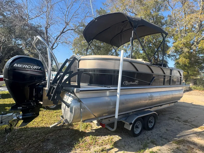 Slide: The Image of 2019 Misty Harbor 2285 Biscayne Bay CE pontoon boat with Mercury engine on trailer. - 2
