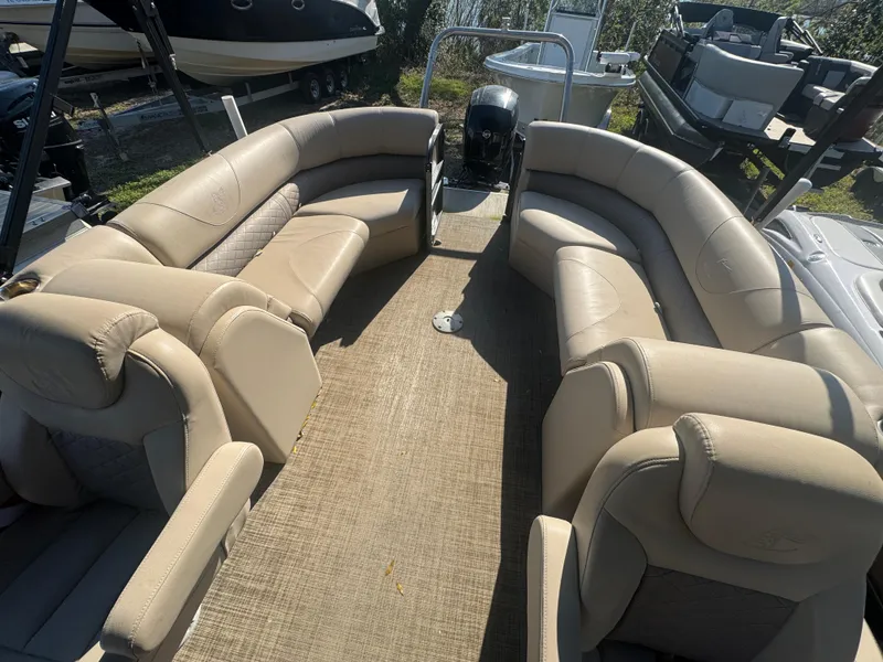 Slide: The Image of 2019 Misty Harbor 2285 Biscayne Bay CE pontoon boat with beige seating and spacious interior. - 4