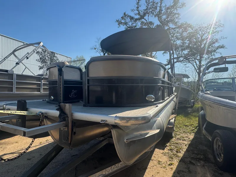 Slide: The Image of 2019 Misty Harbor 2285 Biscayne Bay CE pontoon boat on trailer, outdoors. - 7