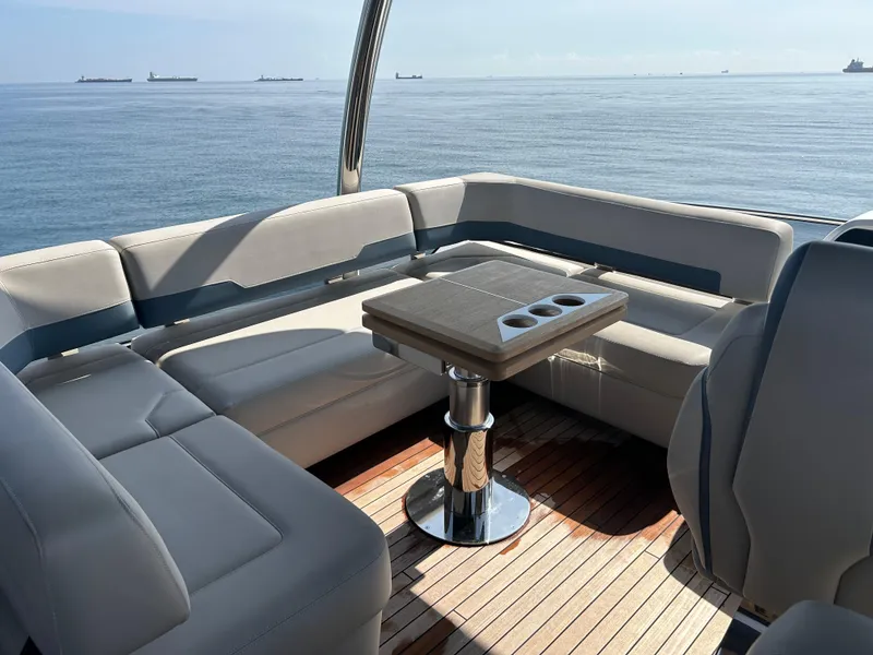 Slide: The Image of Luxurious seating area on 2024 Fairline Squadron 68 yacht with ocean view. - 23