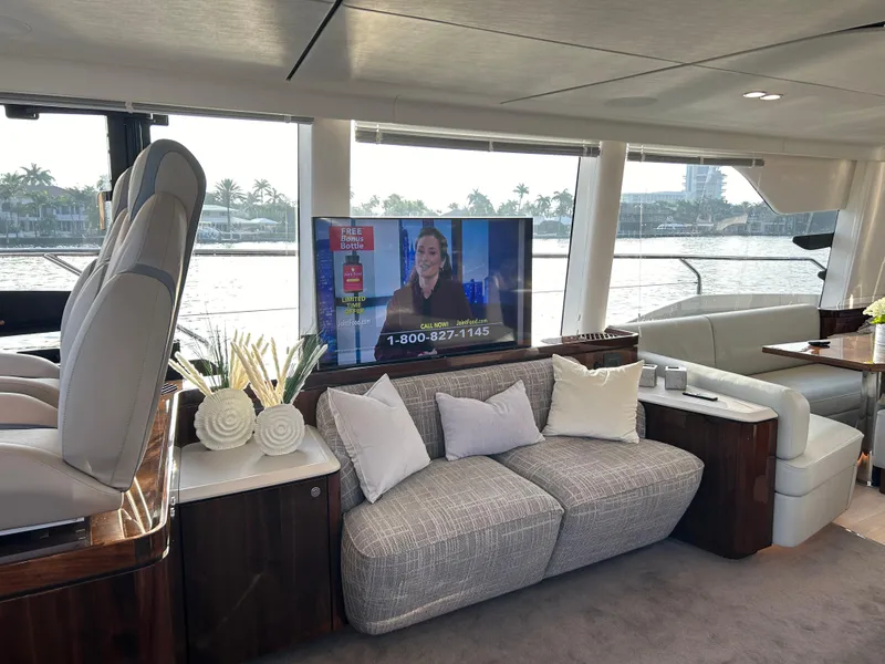 Slide: The Image of Luxurious interior of 2024 Fairline Squadron 68 yacht with modern seating and TV. - 4
