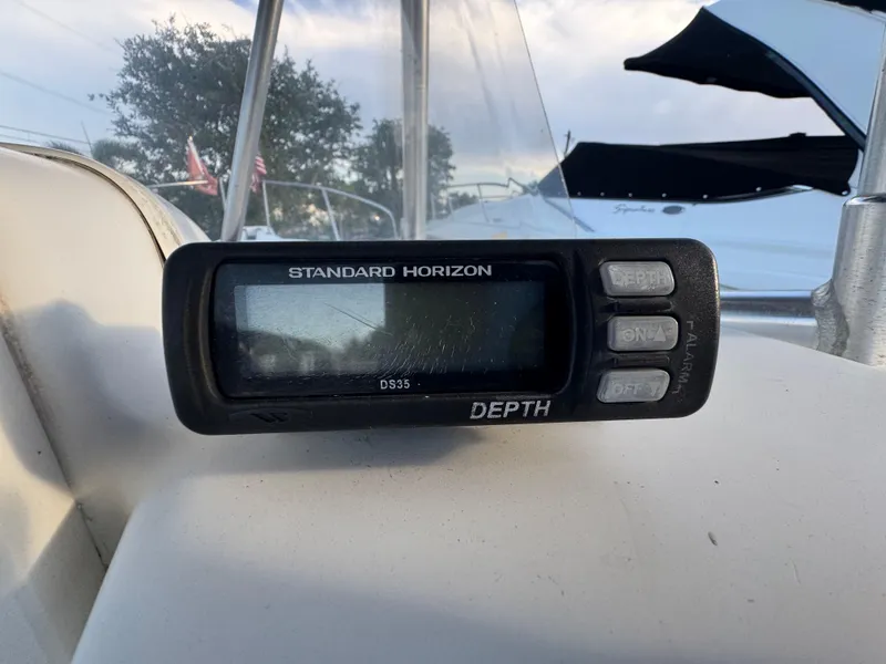 Slide: The Image of Depth gauge on 2000 Boston Whaler 26 Outrage boat dashboard. - 16