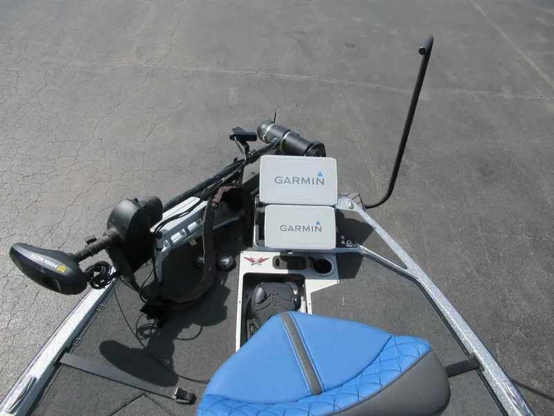 Slide: The Image of 2021 Vexus VX20 boat deck with Garmin electronics and blue seat. - 4