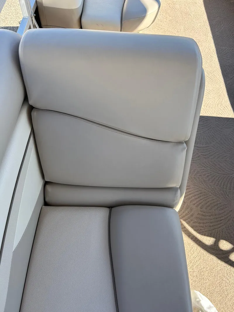 Slide: The Image of 2012 Bennington 20SLi boat seat with light gray upholstery. - 16