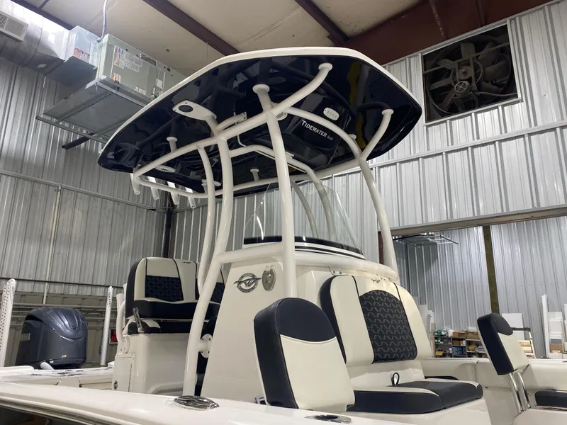Slide: The Image of 2022 Tidewater 2500 Carolina Bay boat in a metal storage facility. - 9