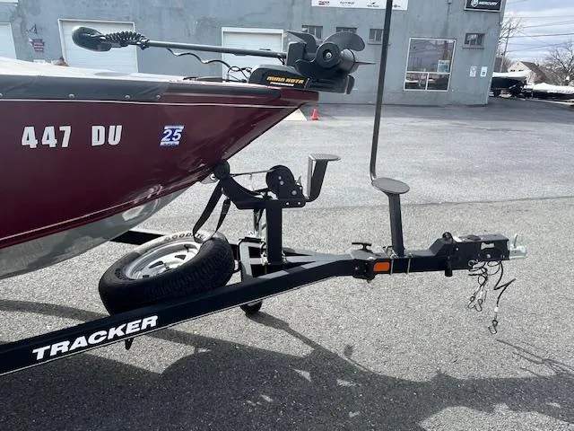 Slide: The Image of 2018 Tracker Pro Guide V-175 WT boat on trailer, parked in a lot. - 11