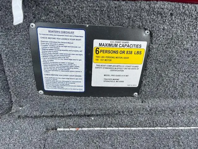Slide: The Image of 2018 Tracker Pro Guide V-175 WT capacity plate, showing maximum 6 persons or 838 lbs. - 8