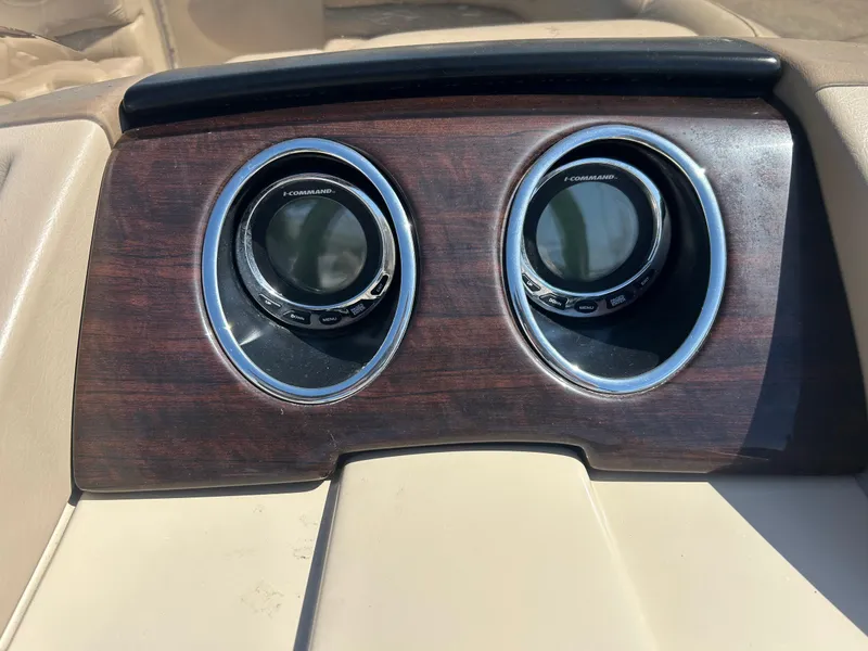 Slide: The Image of Dashboard of 2012 Bennington 2250RCL boat with dual round gauges. - 9