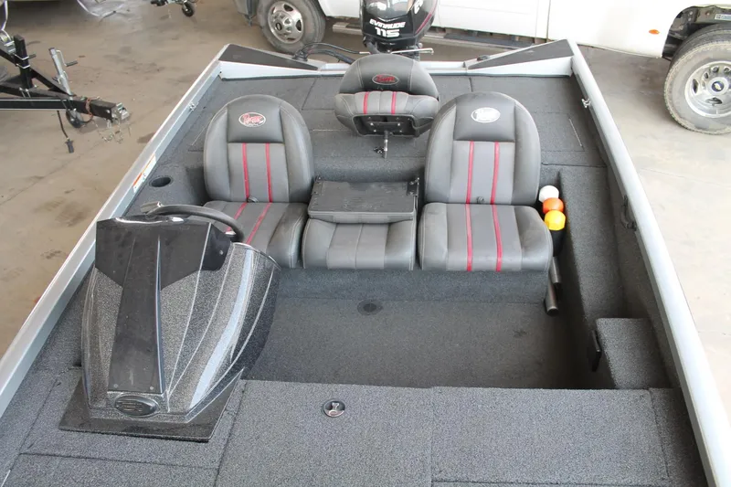 Slide: The Image of 2013 Ranger RT188 boat interior with gray seats and red accents. - 11