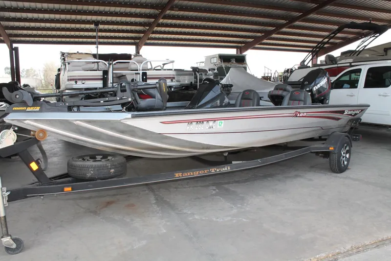 Slide: The Image of 2013 Ranger RT188 fishing boat on trailer in covered storage area. - 16