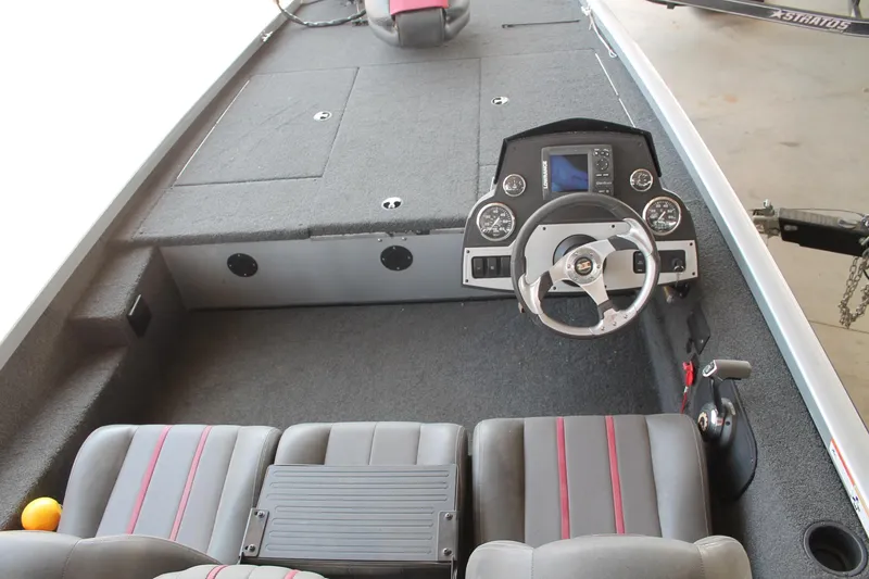 Slide: The Image of 2013 Ranger RT188 boat interior with steering console and seating. - 6