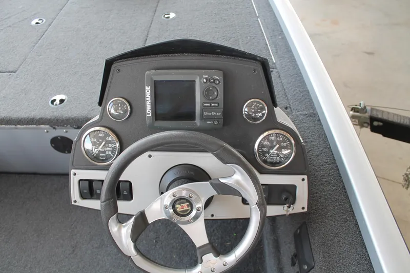 Slide: The Image of Steering console of 2013 Ranger RT188 boat with Lowrance electronics and gauges. - 7