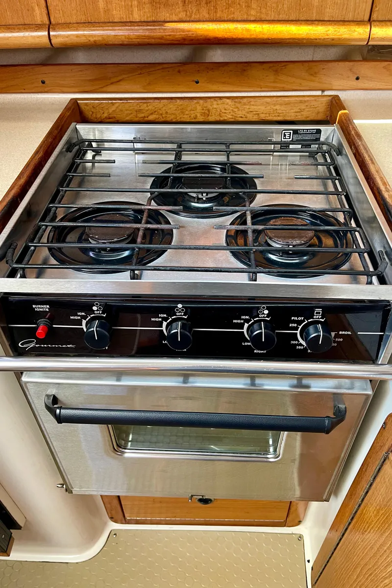 Slide: The Image of Stainless steel stove and oven in a 2001 Catalina 380 yacht kitchen. - 32