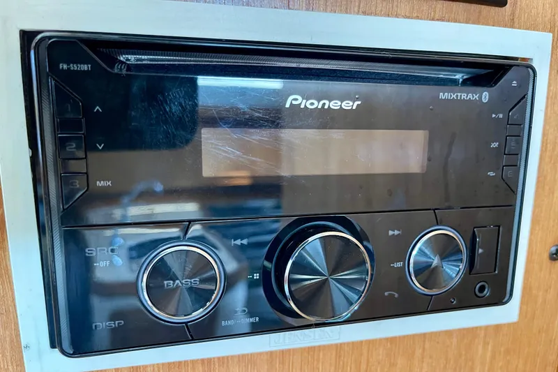 Slide: The Image of Pioneer Mixtrax stereo system in a 2001 Catalina 380 boat interior. - 37