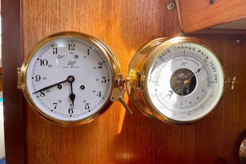 Slide: The Image of Brass clock and barometer on Catalina 380 yacht, 2001 model, mounted on wooden panel. - 40