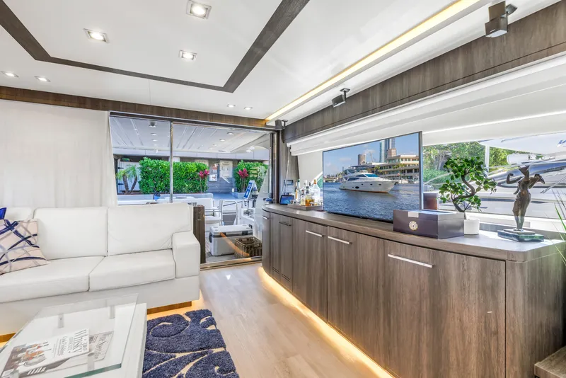 Slide: The Image of Luxurious interior of 2009 Uniesse 65 MY yacht with modern decor and large windows. - 10