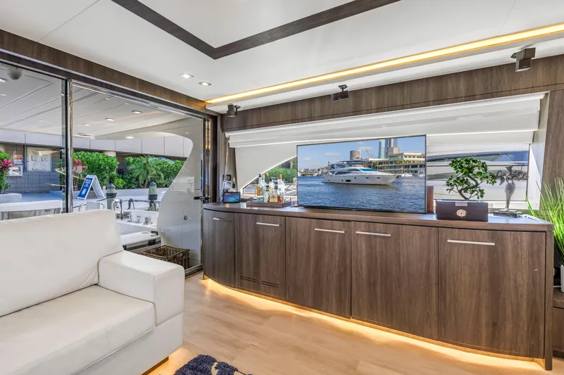 Slide: The Image of Luxurious interior of 2009 Uniesse 65 MY yacht with modern furnishings and large windows. - 11