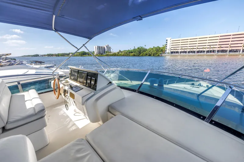 Slide: The Image of Luxurious 2009 Uniesse 65 MY yacht interior with scenic waterfront view. - 24