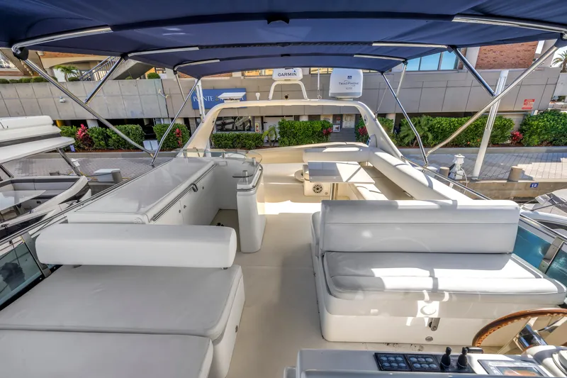 Slide: The Image of Luxurious 2009 Uniesse 65 MY yacht interior with spacious seating and elegant design. - 25