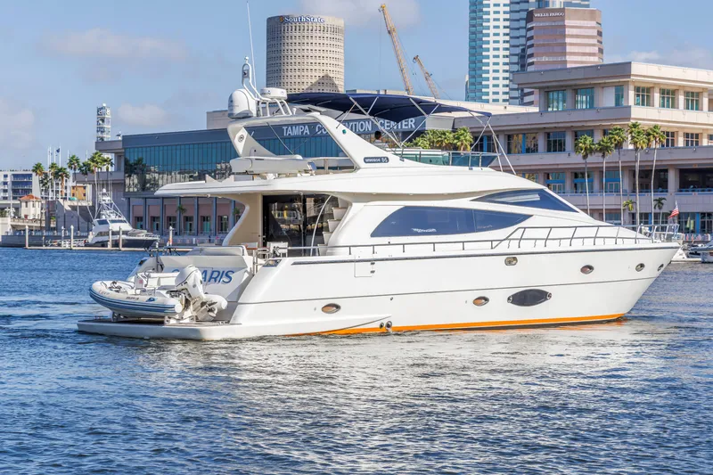 Slide: The Image of 2009 Uniesse 65 MY yacht docked near Tampa Convention Center. - 3