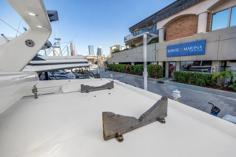 Slide: The Image of 2009 Uniesse 65 MY yacht docked at Ponte Marina, urban backdrop. - 35