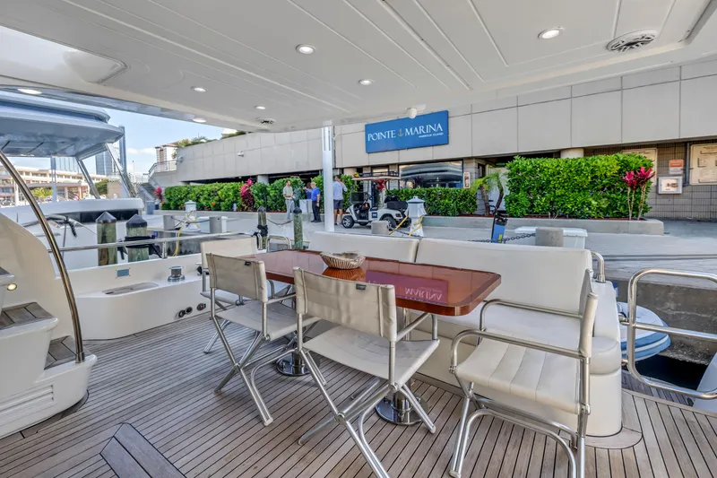 Slide: The Image of Luxury Uniesse 65 MY yacht deck with seating, docked at Ponte Marina, 2009 model. - 40