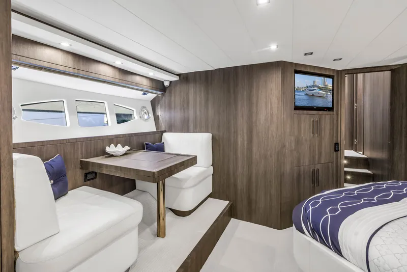 Slide: The Image of Luxurious interior of 2009 Uniesse 65 MY yacht with elegant seating and modern decor. - 46