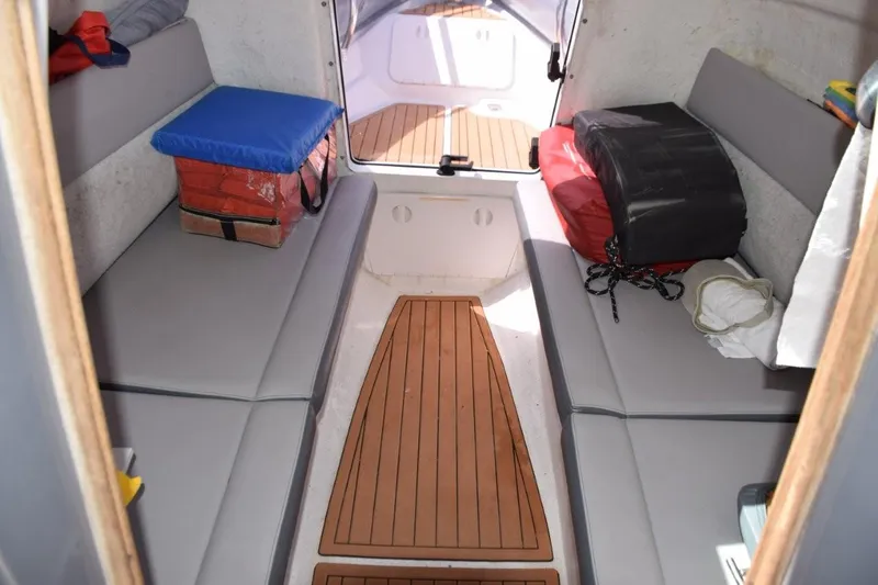 Slide: The Image of Sea-Dek sole, drop-down bucket seats, rear seat with two coolers - 10