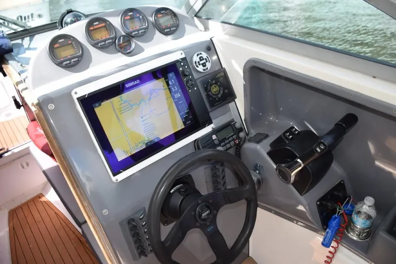 Slide: The Image of Custom helm wheel, ICOM Vhf radio, Yamaha controls - 8
