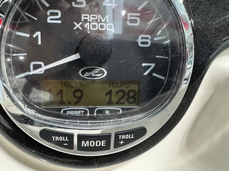 Slide: The Image of Close-up of a 2007 Sea Ray 250 SLX tachometer displaying RPM and digital readings. - 13