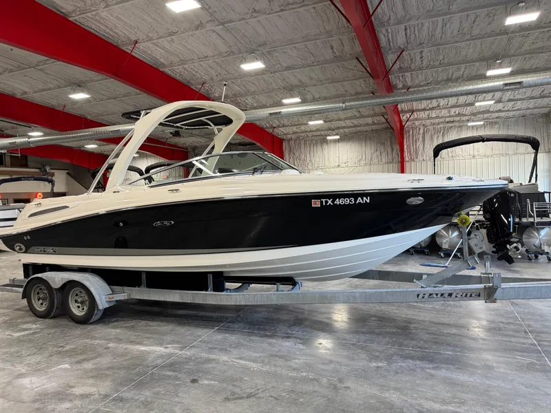 Slide: The Image of 2007 Sea Ray 250 SLX boat on trailer in indoor storage facility. - 4