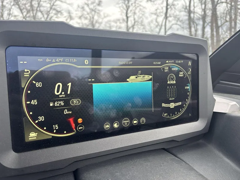 Slide: The Image of Dashboard display of a 2022 Malibu 21lx boat showing speed, temperature, and settings. - 12