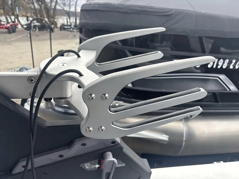 Slide: The Image of Close-up of a 2022 Malibu 21lx boat accessory with sleek metal design. - 16