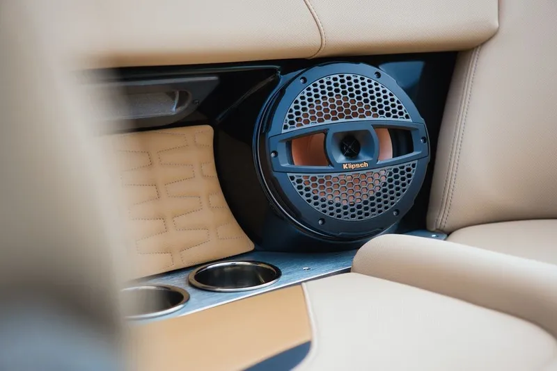 Slide: The Image of MasterCraft X22 2025 speaker and cup holder detail view. - 10